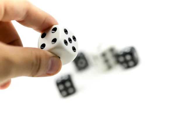 Hand & Rolling Dices,gambling and business risk concept.