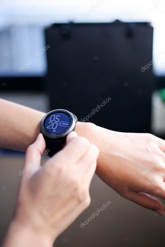 Use of fitness smart watch to monitor her performance.