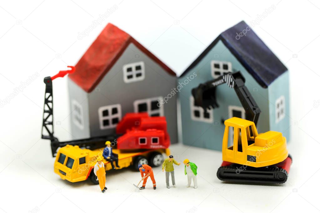 Miniature people : worker team for building home ,Image use for 