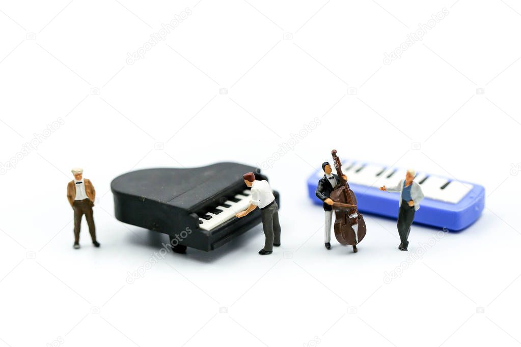 Miniature people : pianist playing piano and Violinist Man,playi