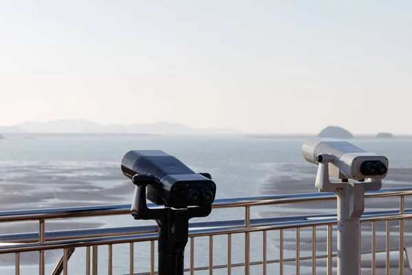 Tourist binoculars. Binoculars telescope on observation deck for tourist. Observatory telescope. Observation Binoculars.