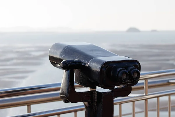 Tourist binoculars. Binoculars telescope on observation deck for tourist. Observatory telescope. Observation Binoculars.