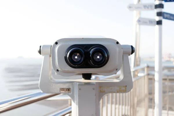 Tourist binoculars. Binoculars telescope on observation deck for tourist. Observatory telescope. Observation Binoculars.