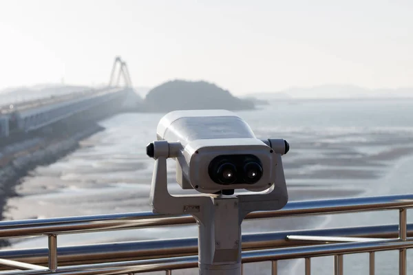 Tourist binoculars. Binoculars telescope on observation deck for tourist. Observatory telescope. Observation Binoculars.