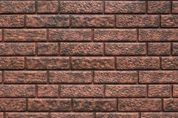 Weathered texture of stained old dark brown and red brick wall background, grungy rusty blocks of stone-work technology, colorful horizontal architecture — Stock Photo, Image