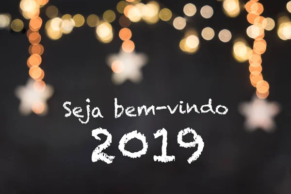 Seja bem-vindo Portekizce hoş geldiniz bulanık ışıkları ve yıldız ile siyah bir arka plan anlamına gelir