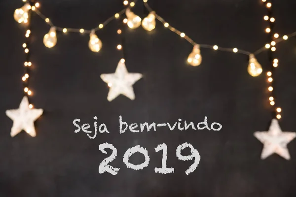 Seja bem-vindo Portekizce hoş geldiniz bulanık ışıkları ve yıldız ile siyah bir arka plan anlamına gelir