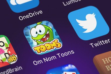 London, United Kingdom - September 29, 2018: Close-up shot of ZeptoLab UK Limited's popular app Om Nom Toons. clipart
