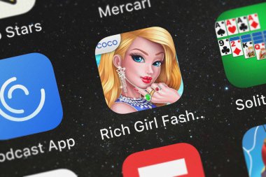 London, Büyük Britanya - 29 Eylül 2018: simge bir iPhone mobil App zengin kız moda alışveriş merkezinden Coco oynamak.
