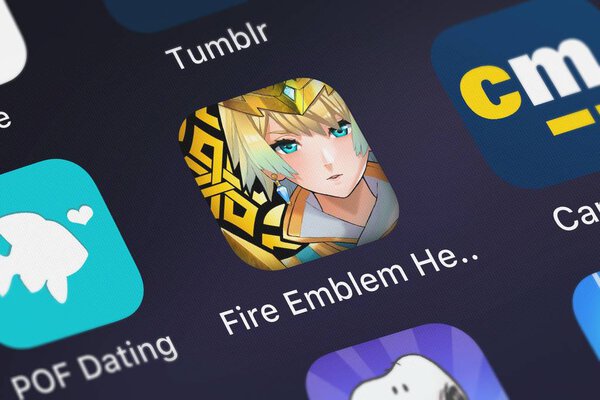 London, United Kingdom - September 29, 2018: Close-up shot of the Fire Emblem Heroes application icon from Nintendo Co., Ltd. on an iPhone.