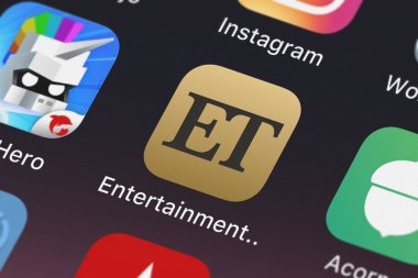 London, United Kingdom - September 29, 2018: Close-up shot of the Entertainment Tonight - ET mobile app from CBS Interactive. clipart