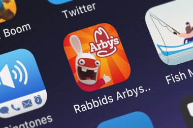 London, United Kingdom - September 29, 2018: Close-up of the Rabbids Arby's Rush icon from Ubisoft on an iPhone. clipart