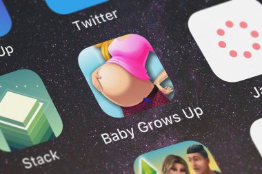 London, Büyük Britanya - 30 Eylül 2018: Close-up bebek büyüdükçe Up - kızları Giydir, makyaj çocuk oyunları simgesinden Ninjafish Studios bir iphone üzerinde.