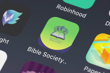 London, Büyük Britanya - 29 Eylül 2018: yakın çekim çekim bir iphone üzerinde inanç gelir işitme tarafından gelen İncil Derneği Malezya uygulama simgesi.