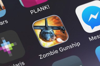 London, Büyük Britanya - 30 Eylül 2018: Zombie savaş helikopteri: silah aşağı zombiler bir iphone ekranında limbik yazılım mobil uygulaması.