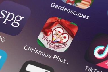 London, Büyük Britanya - 02 Ekim 2018: Close-up Noel fotoğraf kolaj kart Maker - göndermek posta teşekkür ederim dilek tebrik tırnak çıkartmaları simgesinden han peng bir iPhone ile.