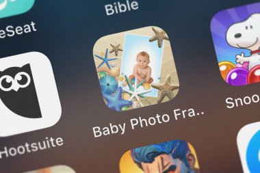 London, Büyük Britanya - 02 Ekim 2018: Bebek Fotoğraf çerçeveleri resim efektleri - bebek çocuk kız mobil app Ankur Chauhan üzerinden bir iphone ekranında.