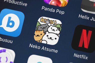 London, Büyük Britanya - 02 Ekim 2018: yakın çekim çekim Neko Atsume: Kitty toplayıcı uygulama simgesine bir iphone Hit-nokta Co., Ltd..