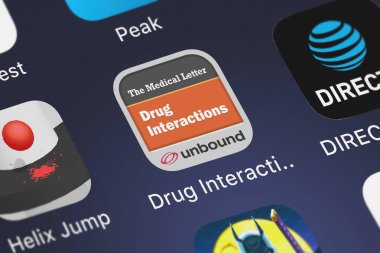 London, United Kingdom - October 02, 2018: Close-up shot of Unbound Medicine, Inc.'s popular app Drug Interactions with Updates. clipart