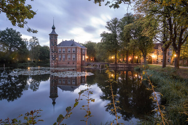 Castle Bouvigne and the surrounding park with reflection in water situated near the Dutch city of Breda in Netherlands