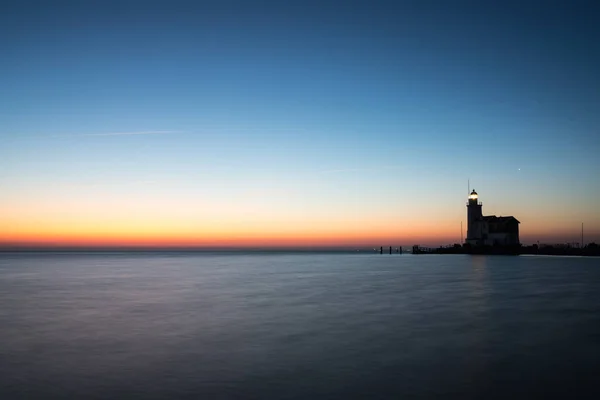 Lichthouse whit zonsopgang — Stockfoto