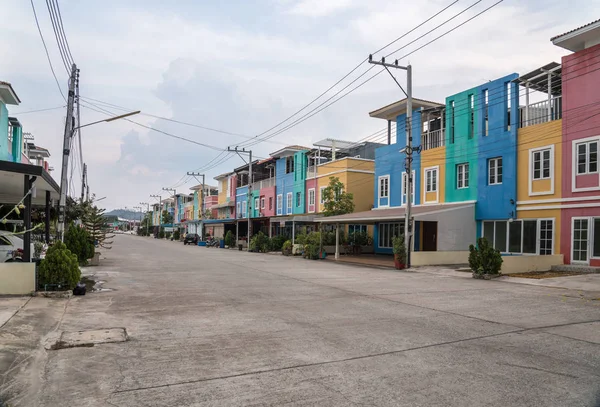 colored houses in the street