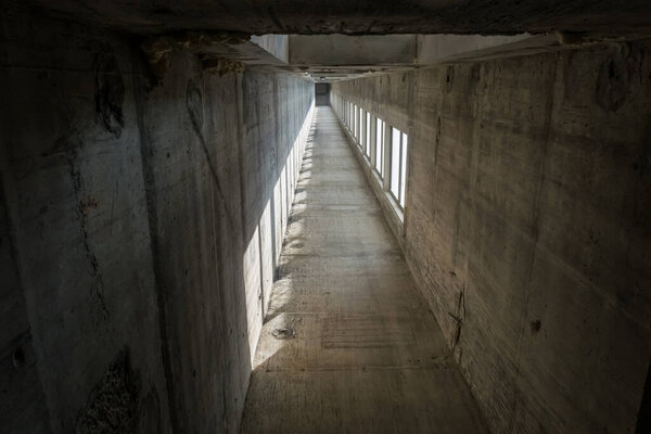 an empty elevator shaft in to construction in a high building