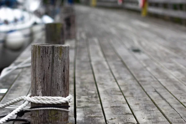 Close up old wooden pier for boats and ships — Stock Photo, Image