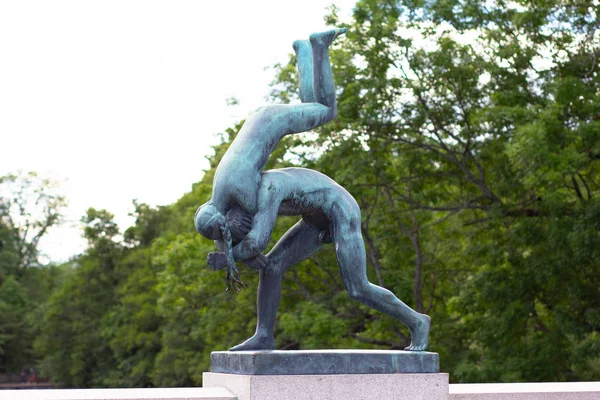 Oslo Norway - 22 june 2019: Sculpture of playing man and woman in Vigeland Park — Stock Photo, Image