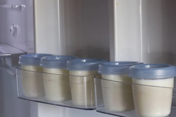 Breast milk storage stored in the side of refrigerator