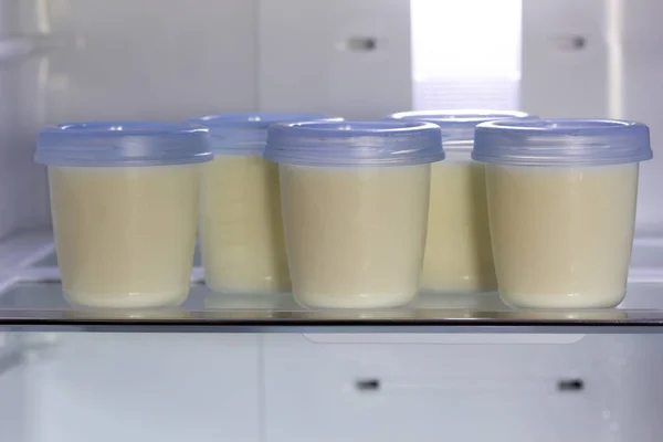 Breast milk storage stored in the back of refrigerator