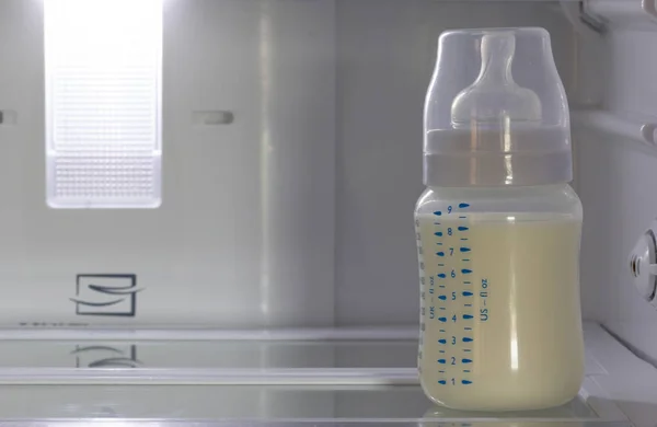 Breast milk storage stored in the back of the refrigerator