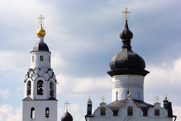 Domes of russian churches in Sviyazhsk on the blue sky