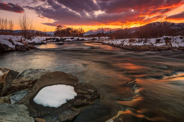 winter sunset at the Provo River, Heber Valley, Utah, USA.