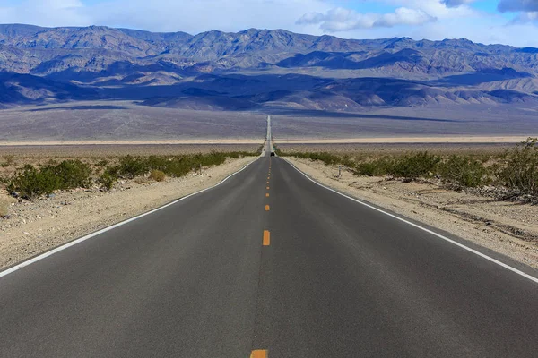 Empty road in the California desert, USA.