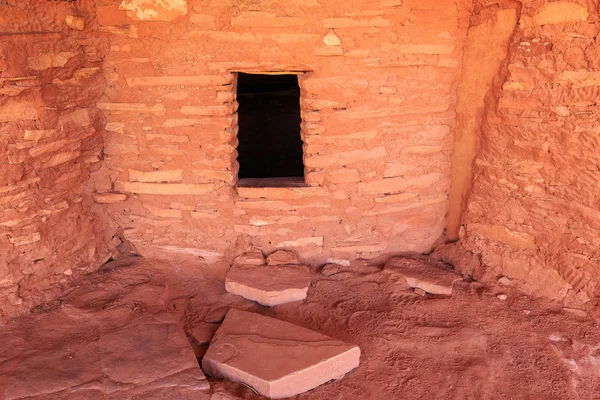 ruins of house of Native Americans in a desert canyon landscape, Utah, USA