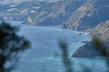 gün batımı yürümek-den geçerek denize bakarak Cerro yağ dağ