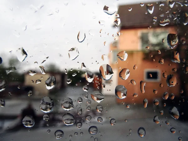 Naranja Casa Detrás Gotas Agua — Foto de Stock