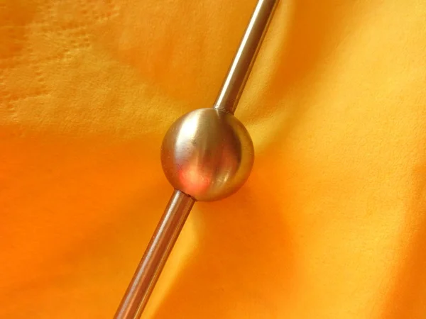 Steel Ball Yellow Background — Stock Photo, Image