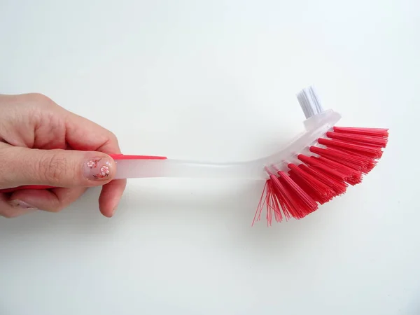 Hand Holding Red Cleaning Brush — Stock Photo, Image