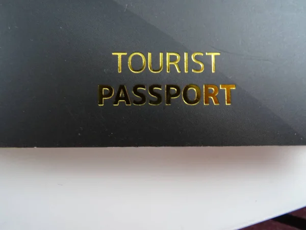 Black Tourist Pasport Golden Letters — Stock Photo, Image