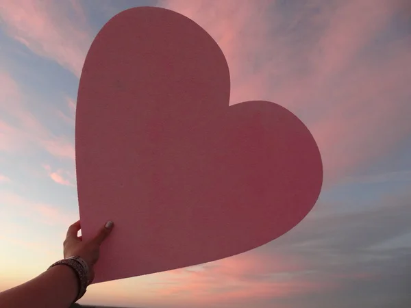 Female Hand Holding Big Pink Heart Background Pink — Stock Photo, Image