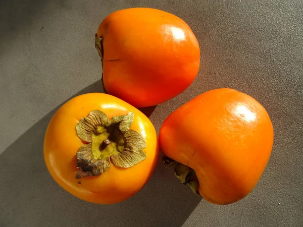Organiska Läckra Orange Persimoner — Stockfoto