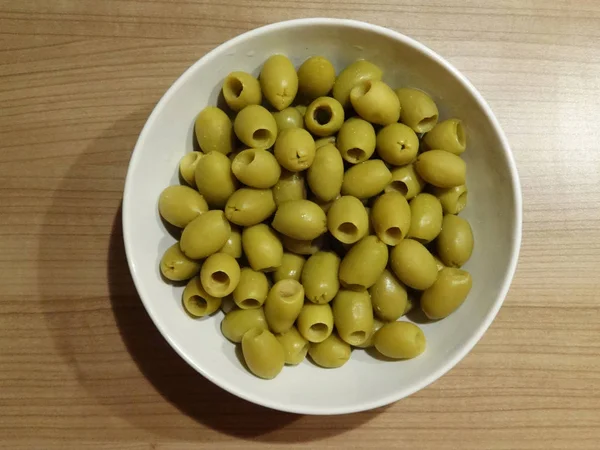 Green Olives Pits White Bowl — Stock Photo, Image