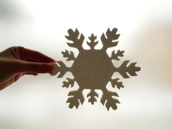 Hand Holding White Snowflake Decoration — Stock Photo, Image