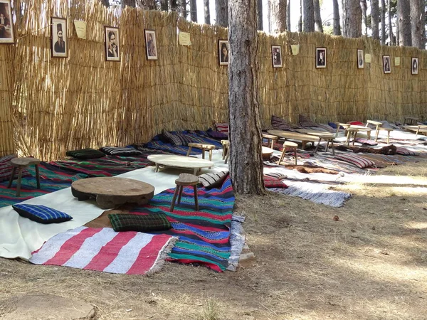 Native Bulgarian Rugs and Tables on the Ground