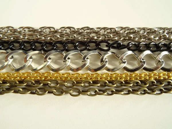 Silver, Gold and Black Jewelry Chain