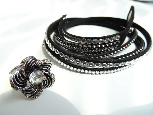 Black Fashion Bracelet with White Crystals and a Silver Flower R