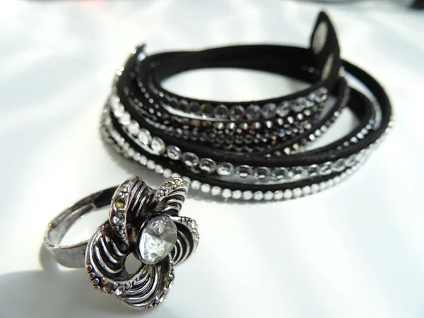 Black Fashion Bracelet with White Crystals and a Silver Flower R