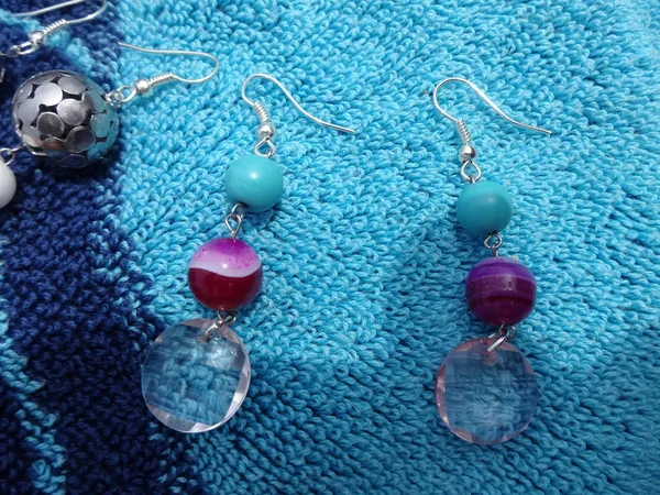 Summer Colourful Gemstone Earrings on a Blue Towel
